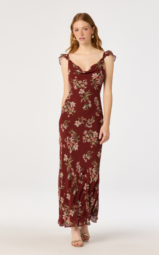 Turn heads in this effortlessly romantic floral satin midi dress, designed to bring timeless elegance to every occasion. Featuring a beautiful allover floral print, this feminine dress is crafted from silky satin fabric with a flattering bias-cut silhouette that drapes beautifully and enhances your natural shape.

The sweetheart-inspired scoop neckline is accented with soft ruffle trim, while delicate ruffle cap sleeves add a graceful, vintage-inspired touch. The midi length creates a sophisticated look tha