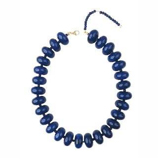 Blue beaded necklace on a white background