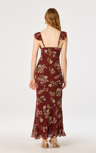 Turn heads in this effortlessly romantic floral satin midi dress, designed to bring timeless elegance to every occasion. Featuring a beautiful allover floral print, this feminine dress is crafted from silky satin fabric with a flattering bias-cut silhouette that drapes beautifully and enhances your natural shape.

The sweetheart-inspired scoop neckline is accented with soft ruffle trim, while delicate ruffle cap sleeves add a graceful, vintage-inspired touch. The midi length creates a sophisticated look tha