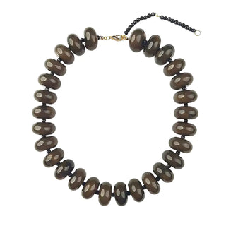 Necklace with brown oval beads on a white background