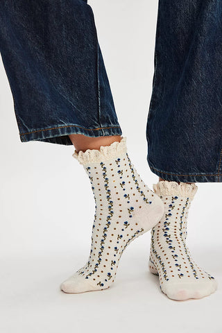 Soft, breathable waffle knit fabric

Delicate floral embroidered details

Pretty crochet lace trim

Comfortable ankle-length fit

Lightweight and perfect for year-round wear

Pairs beautifully with sneakers, sandals, loafers, and boots